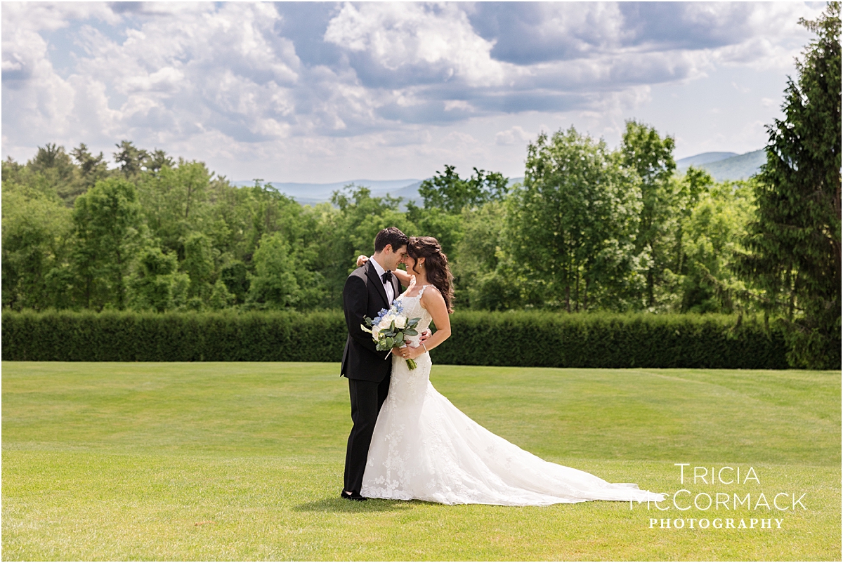 Bride in groom pose at Tanglewood